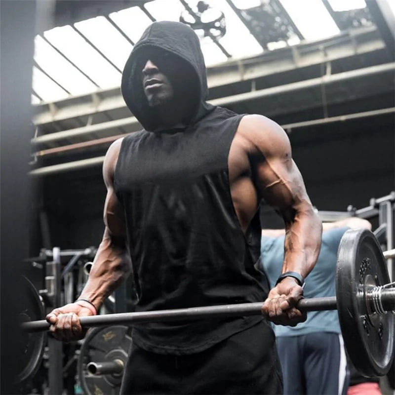 hooded gym shirt Introducing our "Gym Hoodies Tank Top" – the ultimate fusion of style and performance for your gym sessions! Get ready to unleash your inner fitness fanatic